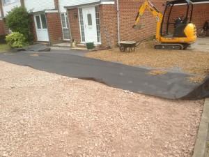 gravel driveway being laid