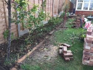 garden brick border under repair